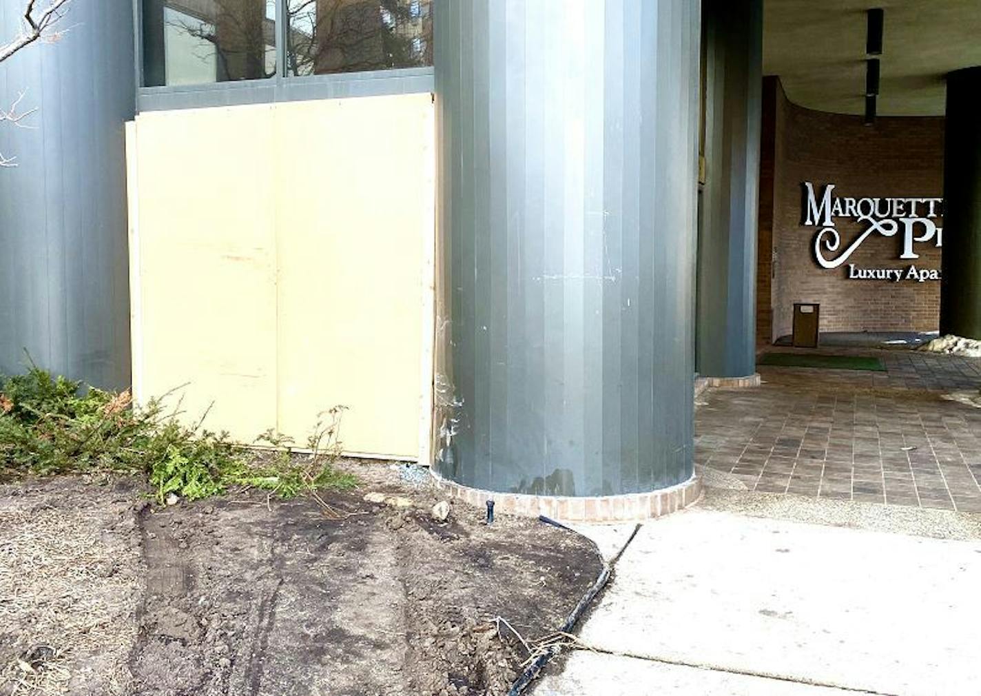 Patchwork was applied to the exterior of this downtown luxury apartment high-rise, where an SUV crashed into the lobby Sunday night. Paul Walsh/Star Tribune