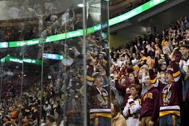 Minnesota Gophers fans in the student section cheered for their team in the third period.