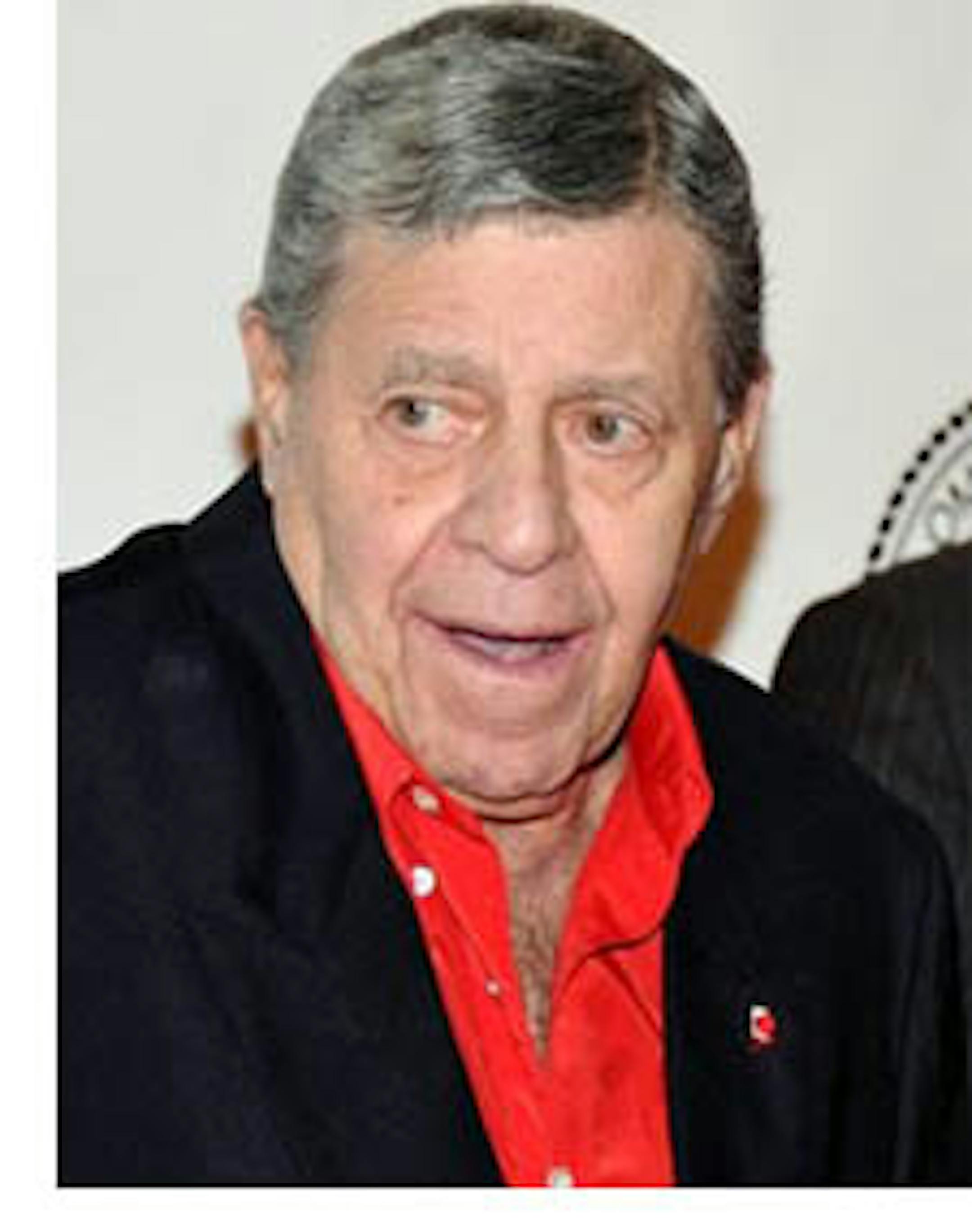 FILE - In this Dec. 1, 2010 file photo, Jerry Lewis attends the Quentin Tarantino Friars Club Roast at the New York Hilton Hotel in New York. Lewis and the Muscular Dystrophy Association aren't saying why they're fully parting ways after 45 years and raising more than $1 billion for the nonprofit through its annual telethon.(AP Photo/Evan Agostini, File)