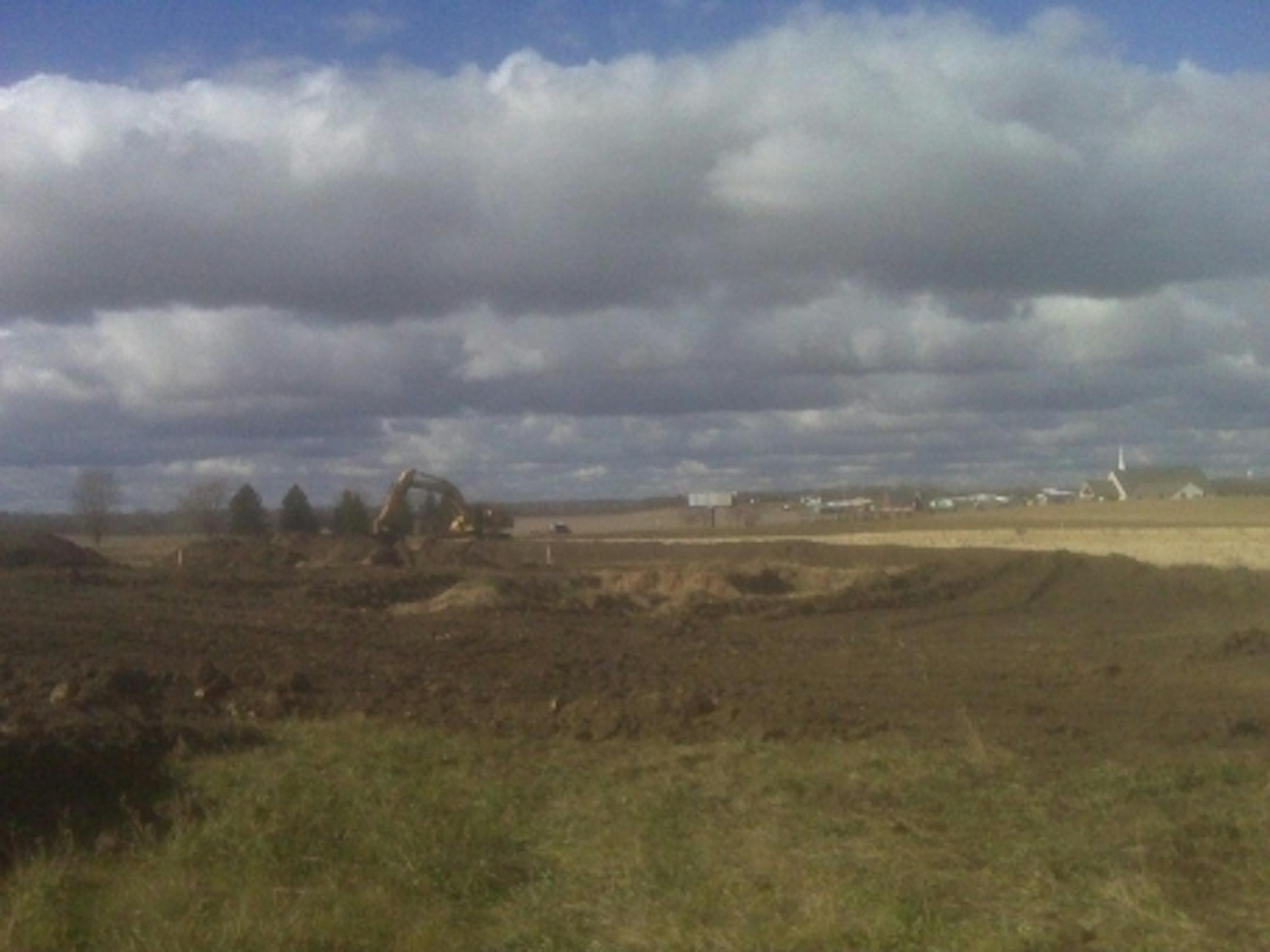 A contractor begins work at the site of Elk Run's first building. Photo was provided by Abraham Algadi, Pine Island's City Administrator.