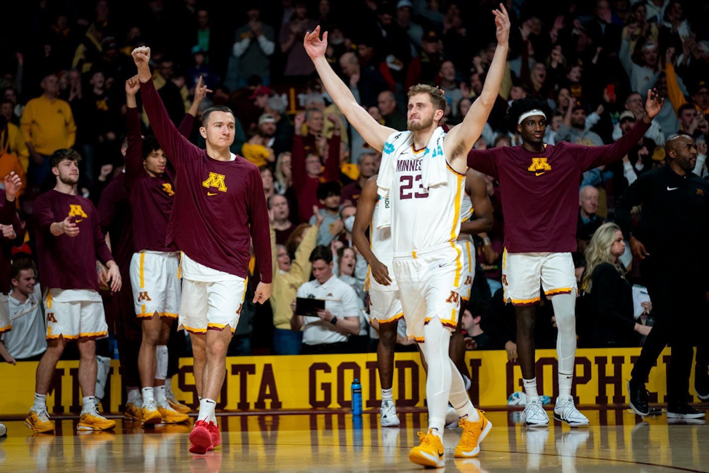 Minnesota players celebrate their hard-earned victory at the basketball game against the Maryland Terrapins in the Williams Arena on Sunday, Jan. 7, 2024 in Minneapolis, Minn. Minnesota won 65-62. ] Angelina Katsanis • angelina.katsanis@startribune.com