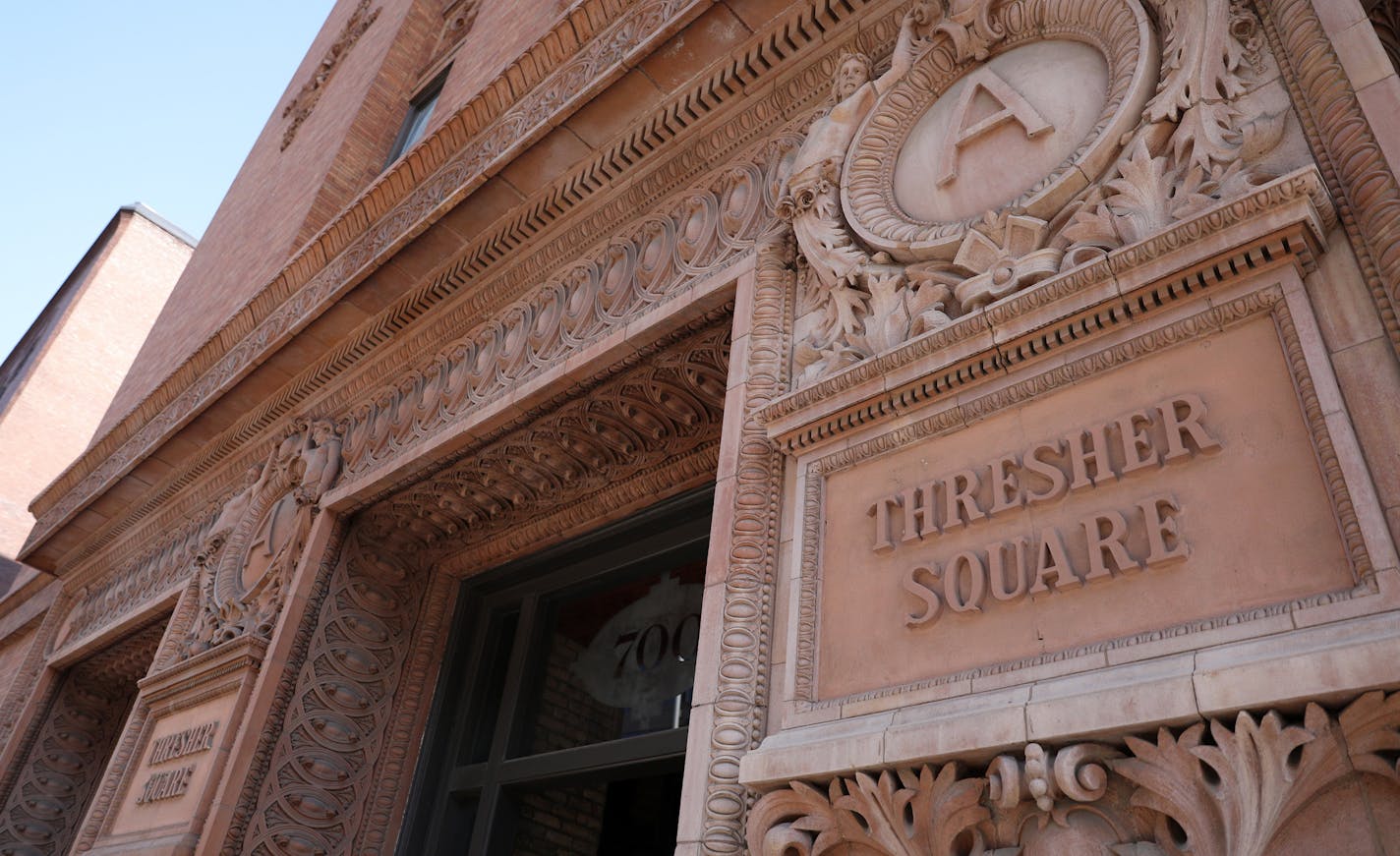 Pictured is the exterior of the Thresher Square building, part of the End Development. ] ANTHONY SOUFFLE &#x2022; anthony.souffle@startribune.com Tours with George Sherman of the East End Development, including the future Trader Joe's, which will open this summer and also tour of HQ apartments Thursday, April 5, 2018 in Minneapolis.