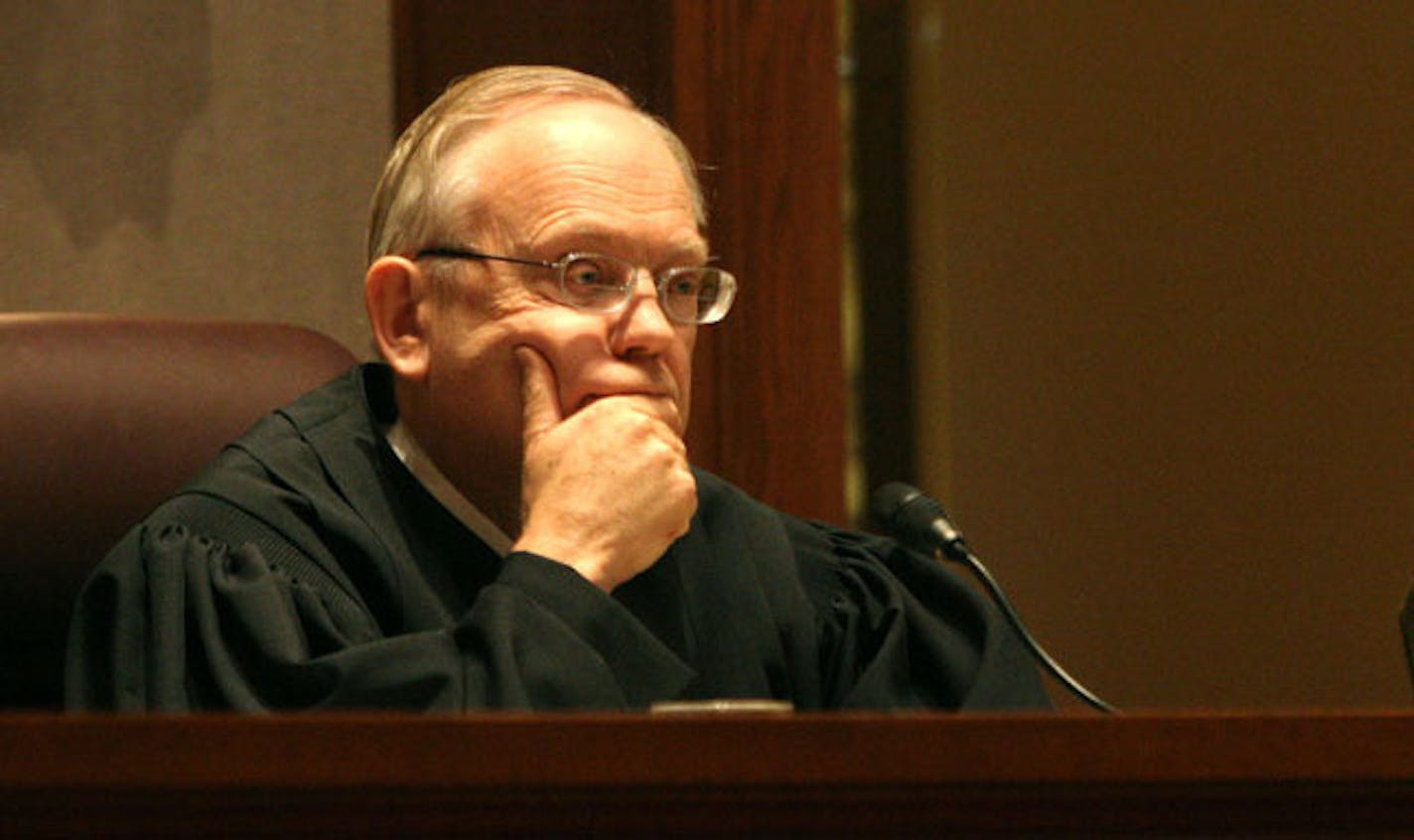 Minnesota Supreme Court Chief Justice Russell Anderson listened to arguments in March 2007.