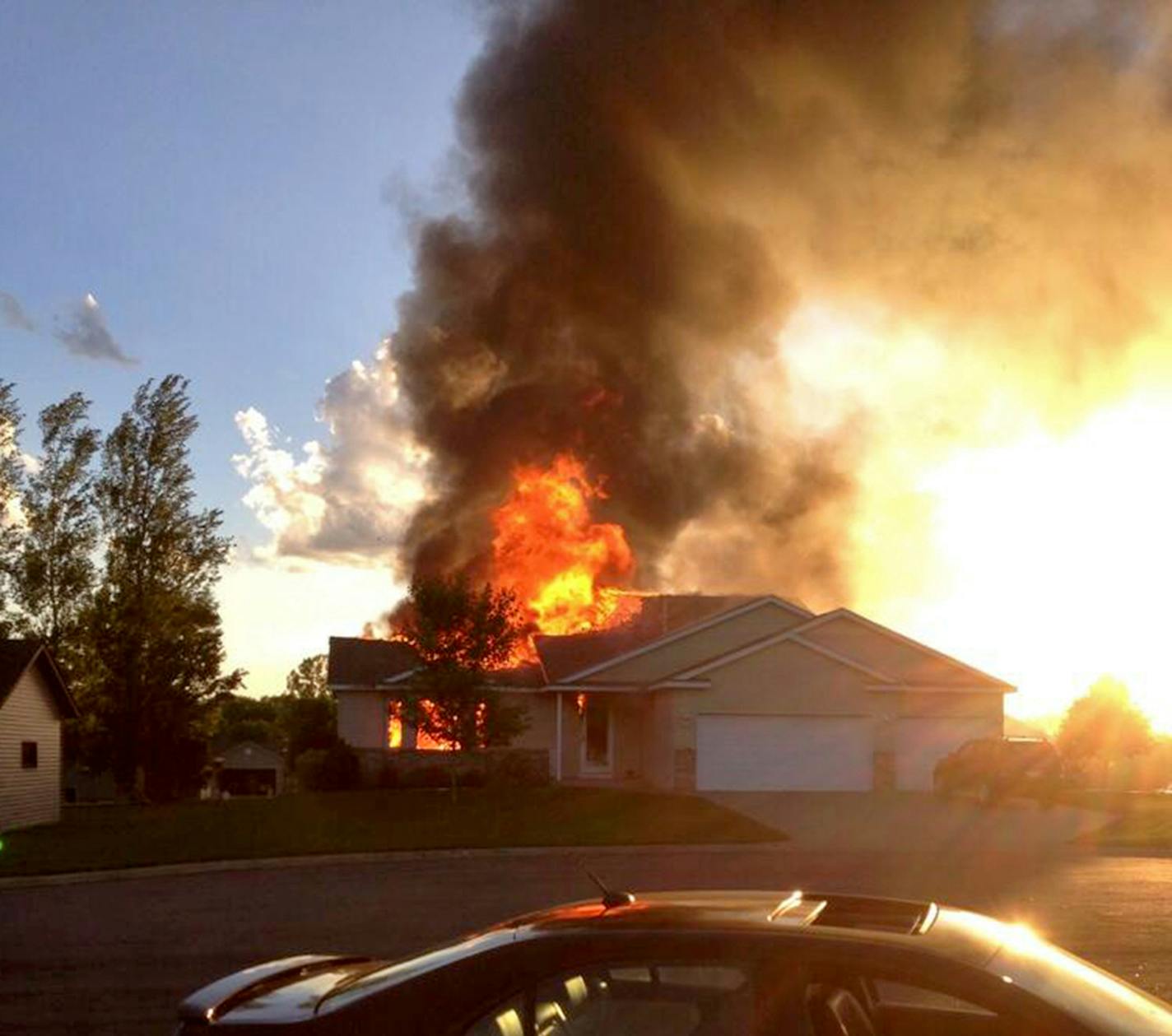 A plane crashed into a house in Sauk Rapids, MN setting it afire