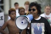 Jeanette Blevins, Thurman's aunt, spoke at the protest about his good character and thanked all who attended the gathering Sunday. ] ALEX KORMANN &#x2