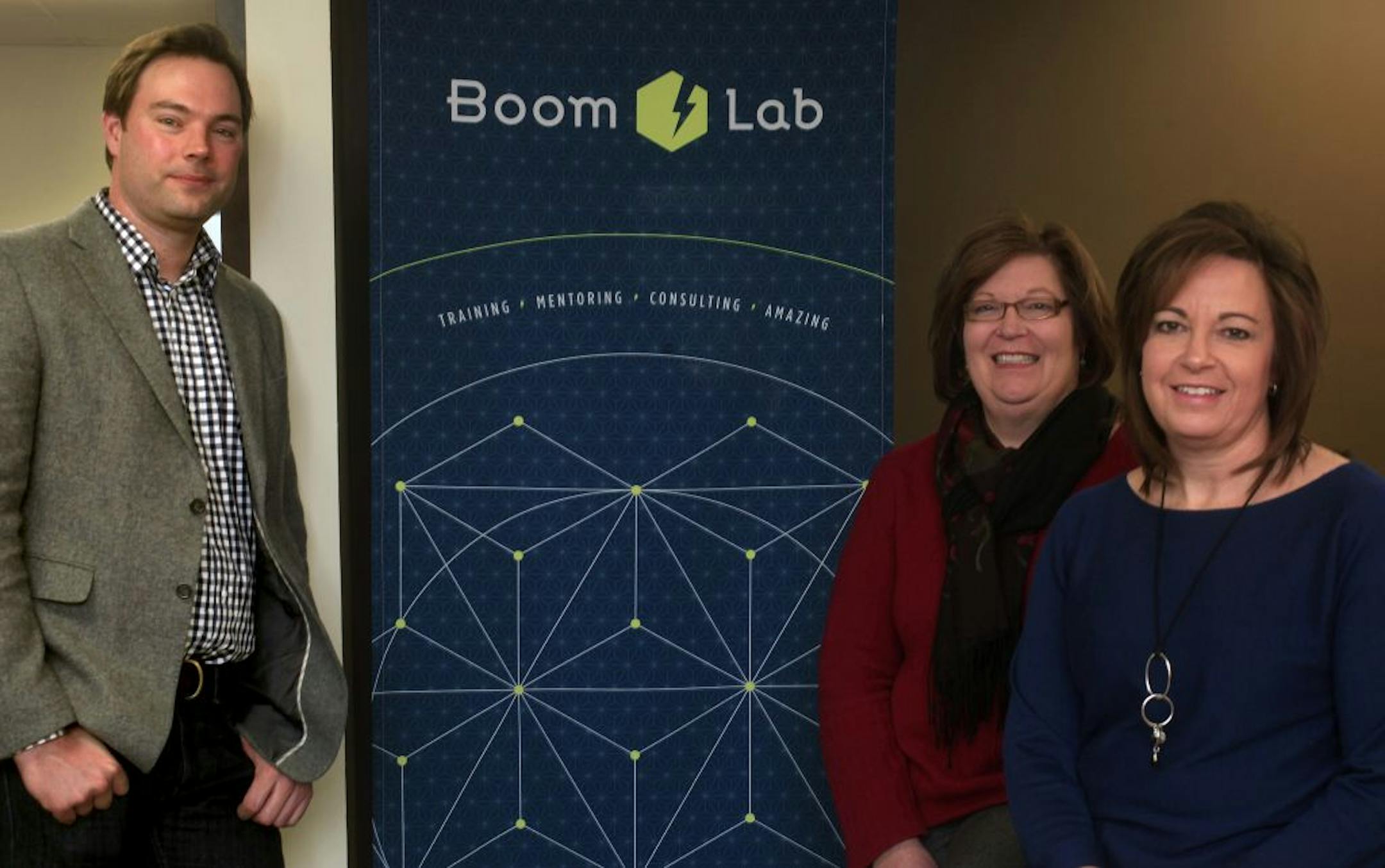 Charlie Anderson, managing partner of Boom Lab (left), Laura Kelly (middle), managing partner at Keyot; and Anjie Cayot, managing partner/ceo, Keyot at their Oakdale MN office on December 20, 2012.
