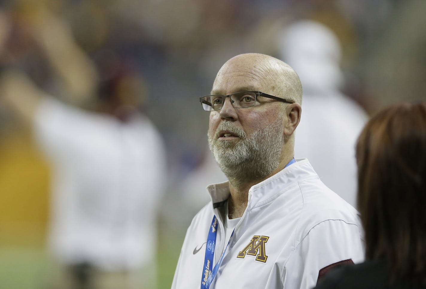 Former Minnesota head football coach Jerry Kill watches from the sidelines during the first half of the Quick Lane Bowl NCAA college football game against Central Michigan, Monday, Dec. 28, 2015, in Detroit. (AP Photo/Carlos Osorio)