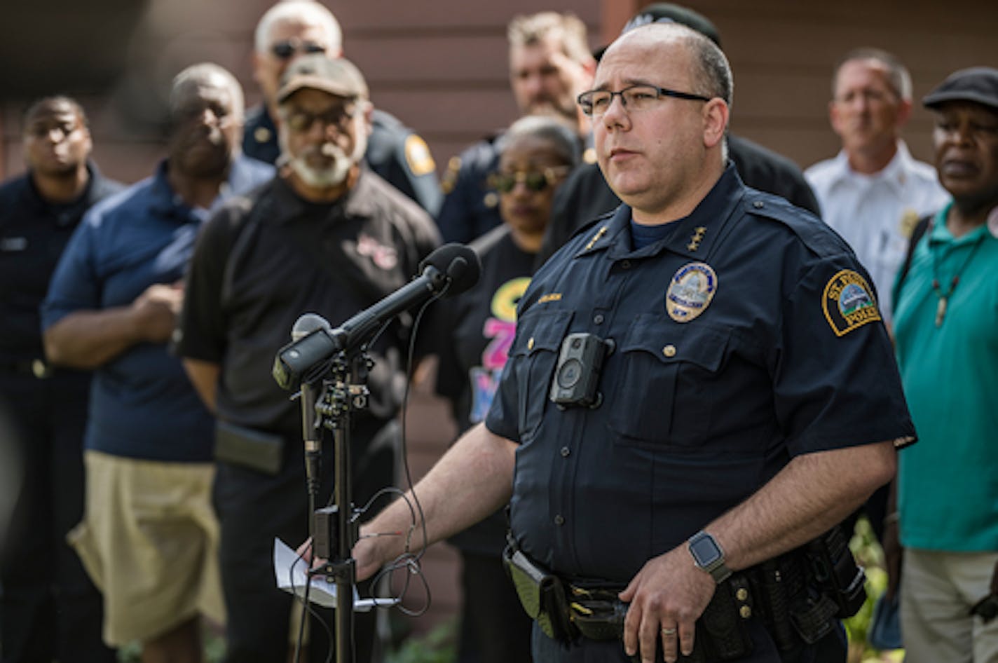 Interim Police Chief Jeremy Ellison discusses some details of the triple homicide that took place across the street in St. Paul, Minn., on Monday, Sept. 5, 2022. Police arrived about 4:30 p.m. Sunday to find two people with gunshot wounds waiting for them outside a two-story home on the 900 block of Case Avenue E. Three more victims were inside the home, and medics pronounced them dead at the scene. ] RICHARD TSONG-TAATARII • richard.tsong-taatarii@startribune.com