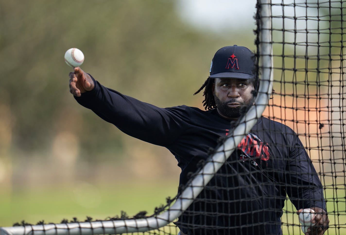 Minnesota Twins third base coach Tommy Watkins, threw batting practice Sunday, Feb.19.2023 in Fort Myers, Fla. ] JERRY HOLT • jerry.holt@startribune.com