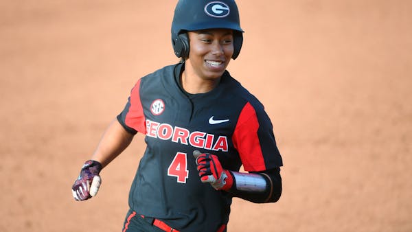 Georgia's Ciara Bryan runs bases during an NCAA softball game against Virginia Tech on Saturday, March 2, 2019 in Athens, Ga. (AP Photo/John Amis)