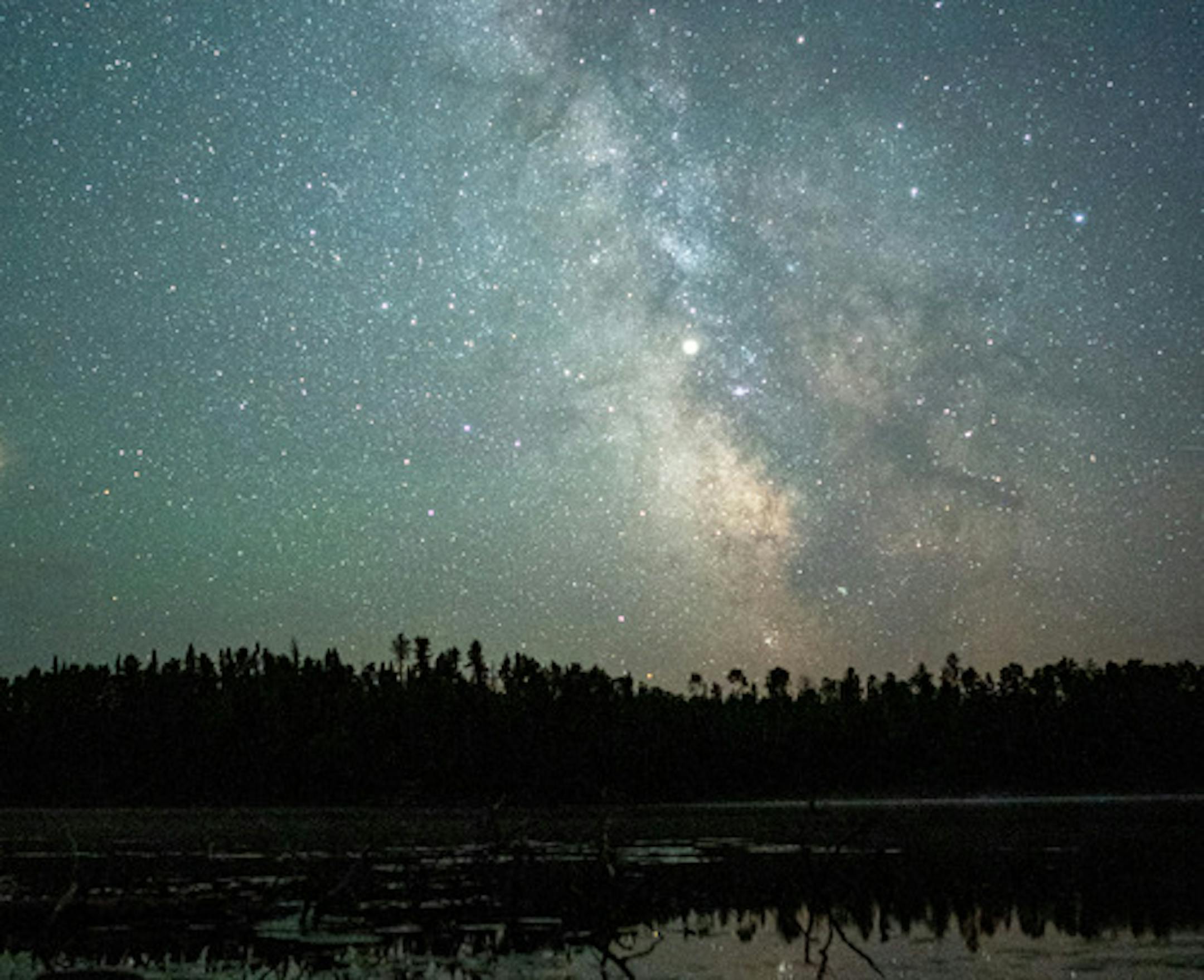 Planets Mars (left) and Saturn (center) shine brightly against the backdrop of the Milky Way above Fire Lake in the Boundary Waters Canoe Area. ] MARK VANCLEAVE ´ The darkness of the Boundary Waters Canoe Area provides for stellar views of the night sky. Photographed Thursday, Aug. 2, 2018. ORG XMIT: MIN2001221157334526