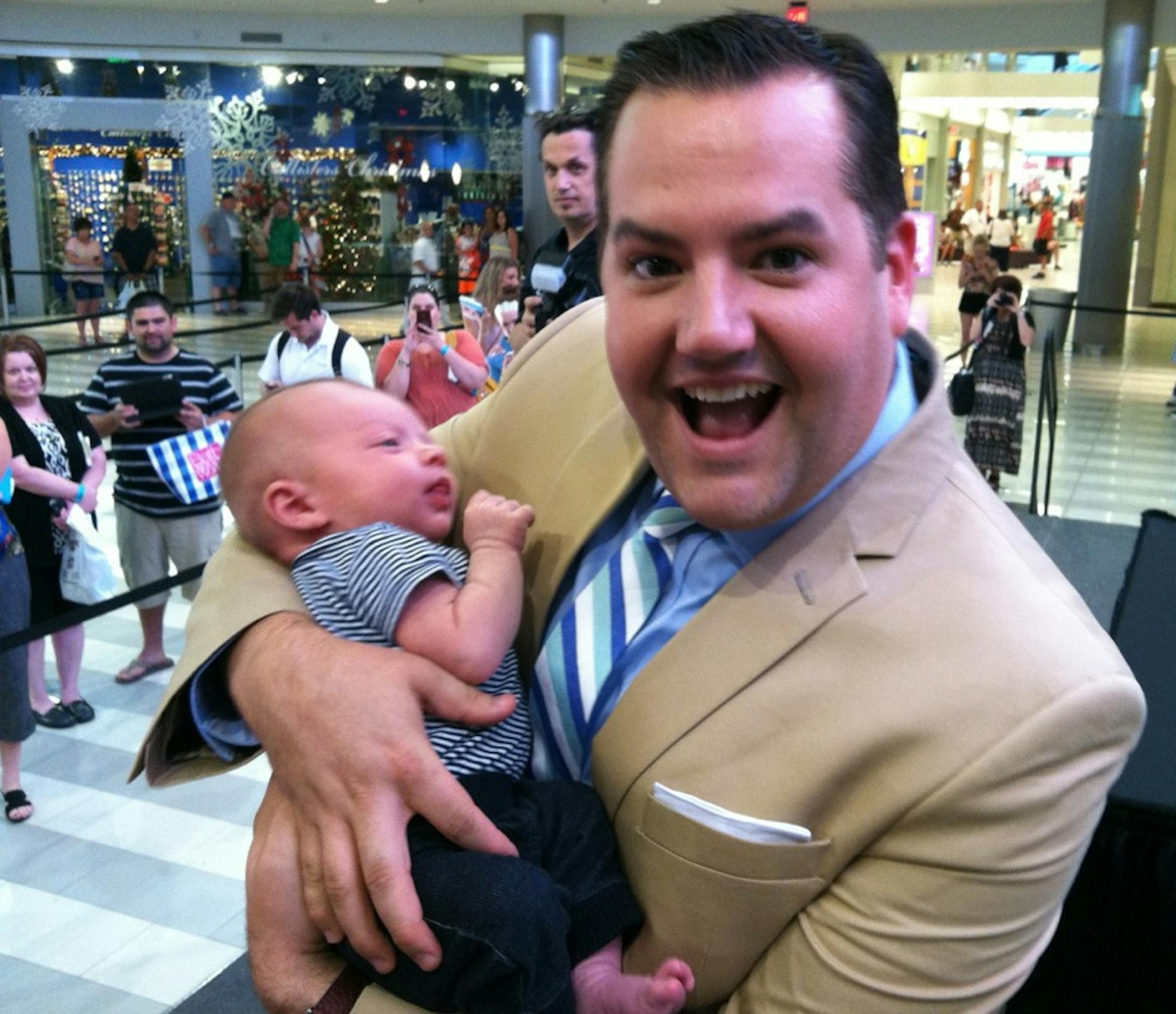 Ross Mathews holding baby Dane Von Miller