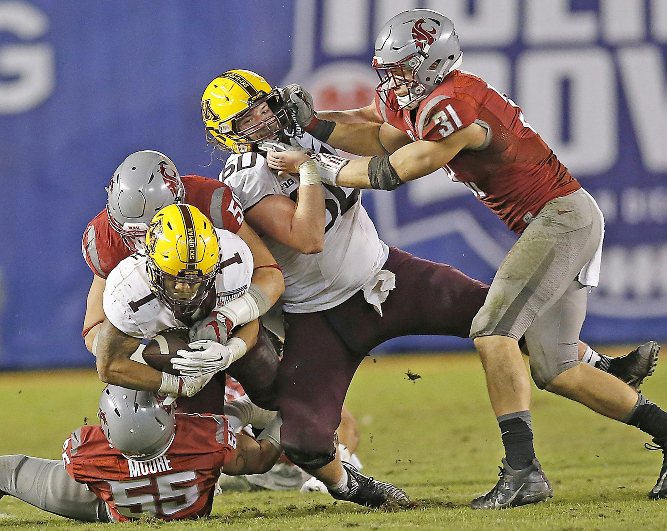Minnesota's offensive lineman Matt Leidner, right, as Minnesota's running back Rodney Smith ran for yards as Minnesota took on Washington State at Qualcomm Stadium for the San Diego Holiday Bowl, Tuesday, December 27, 2016 in San Diego, CA. ] (ELIZABETH FLORES/STAR TRIBUNE) ELIZABETH FLORES &#xef; eflores@startribune.com