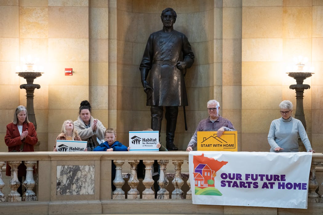 Affordable-housing advocates gathered in the Capitol rotunda Tuesday in St. Paul.
