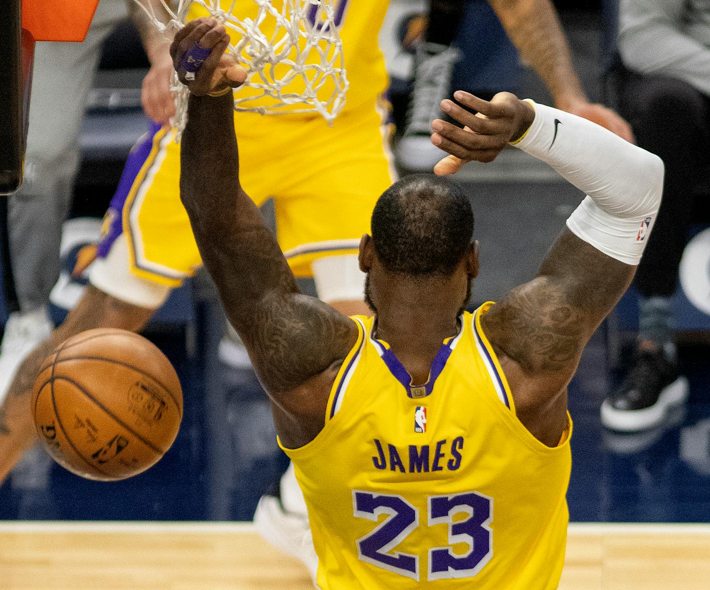 LeBron James of the Lakers dunked the ball in the first quarter Tuesday night at Target Center.