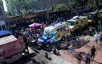 The lines of food trucks along Hennepin Avenue, as seen from the upper level of Kitchen Window. ] Isaac Hale &#xef; isaac.hale@startribune.com The Foo
