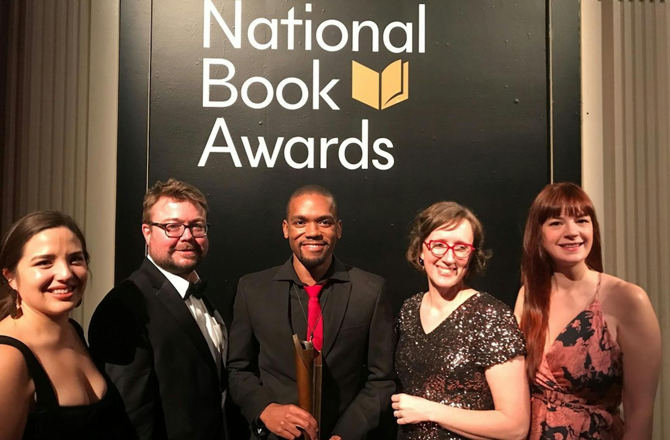 Coffee House Press of Minneapolis will receive a $50,000 grant from Literary Arts Emergency Fund to help them get through COVID. Here, Coffee House publisher Chris Fischbach and writer Phillip Reed celebrate Reed's win at the 2018 National Book Awards. Alsos pictured are Nica Carrillo, Erika Stevens and Mandy Medley