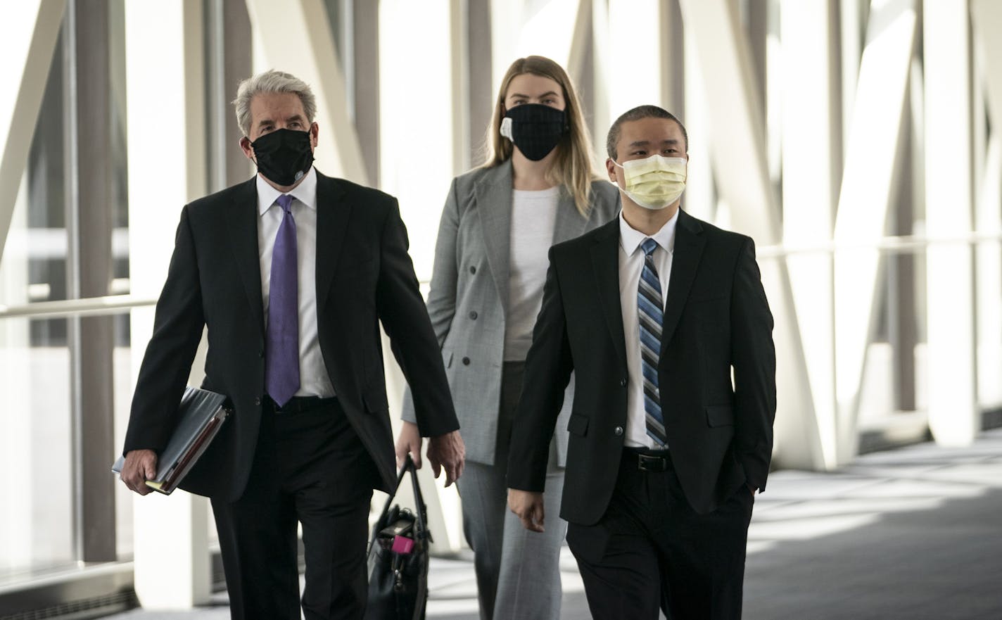 Former Minneapolis police officer Tou Thao, right, arrived with his lawyer Robert Paule, left, for a hearing at the Hennepin County Government Center in Minneapolis, Minn., on Tuesday, July 21, 2020. ] RENEE JONES SCHNEIDER renee.jones@startribune.com