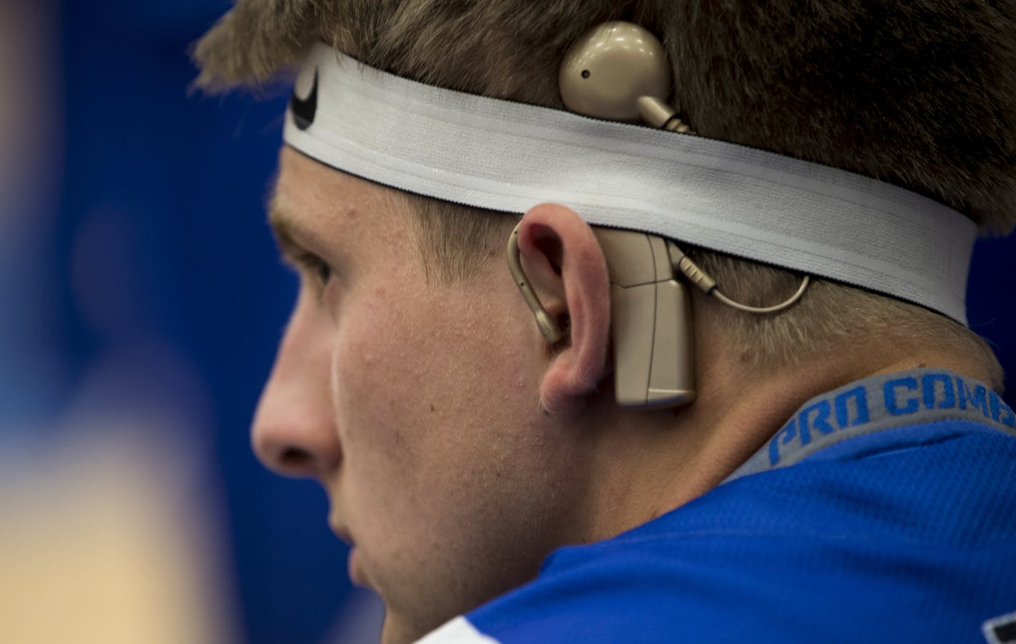 St. Thomas Academy athlete Eddie Perry is required to wear a headband to keep his hearing aids secure to his head.