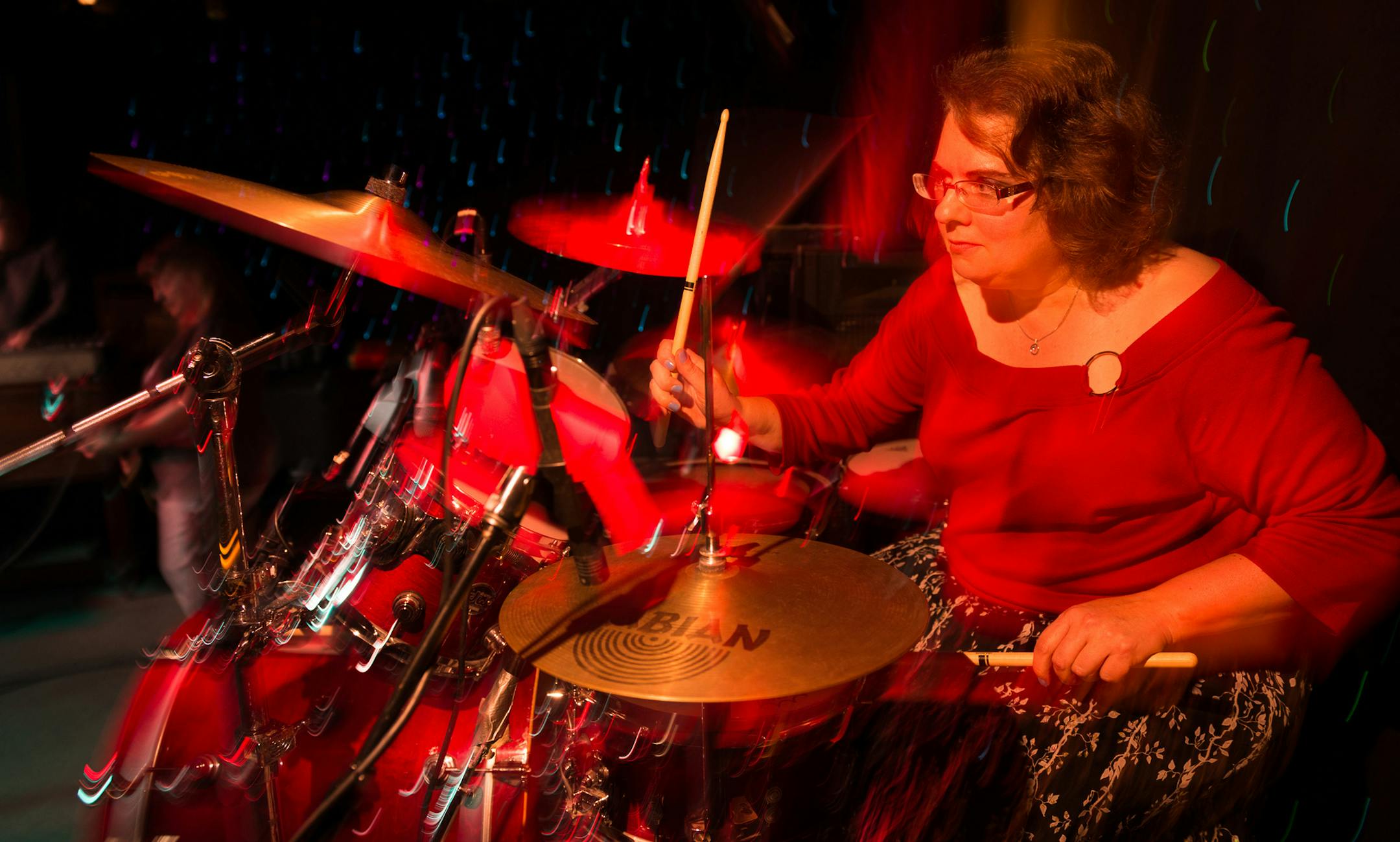 Miriam Queensen with Devin Brown 40 from Elk river pm base ] Special to the Star Tribune - Rich Ryan