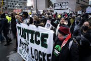 More than 1,000 people walked through downtown Minneapolis on Feb. 5, 2022, to protest the shooting death of Amir Locke by Minneapolis police. The Cit