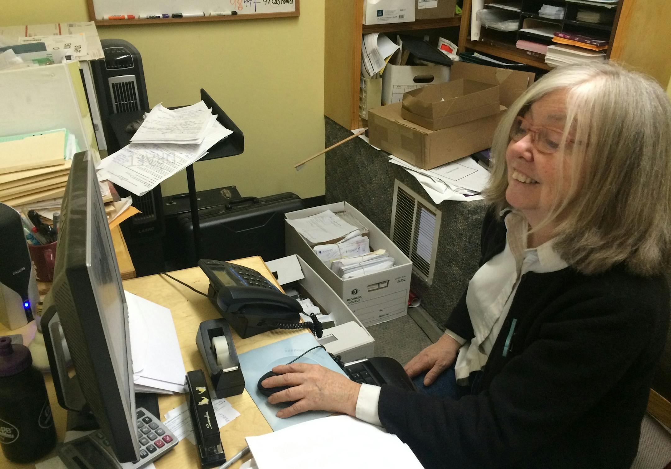 Nancy Vernon was working in Cadenza Music's office when she fell for a phishing scam in October. Now the company that handles its online payments says the music store must pay $40,000.