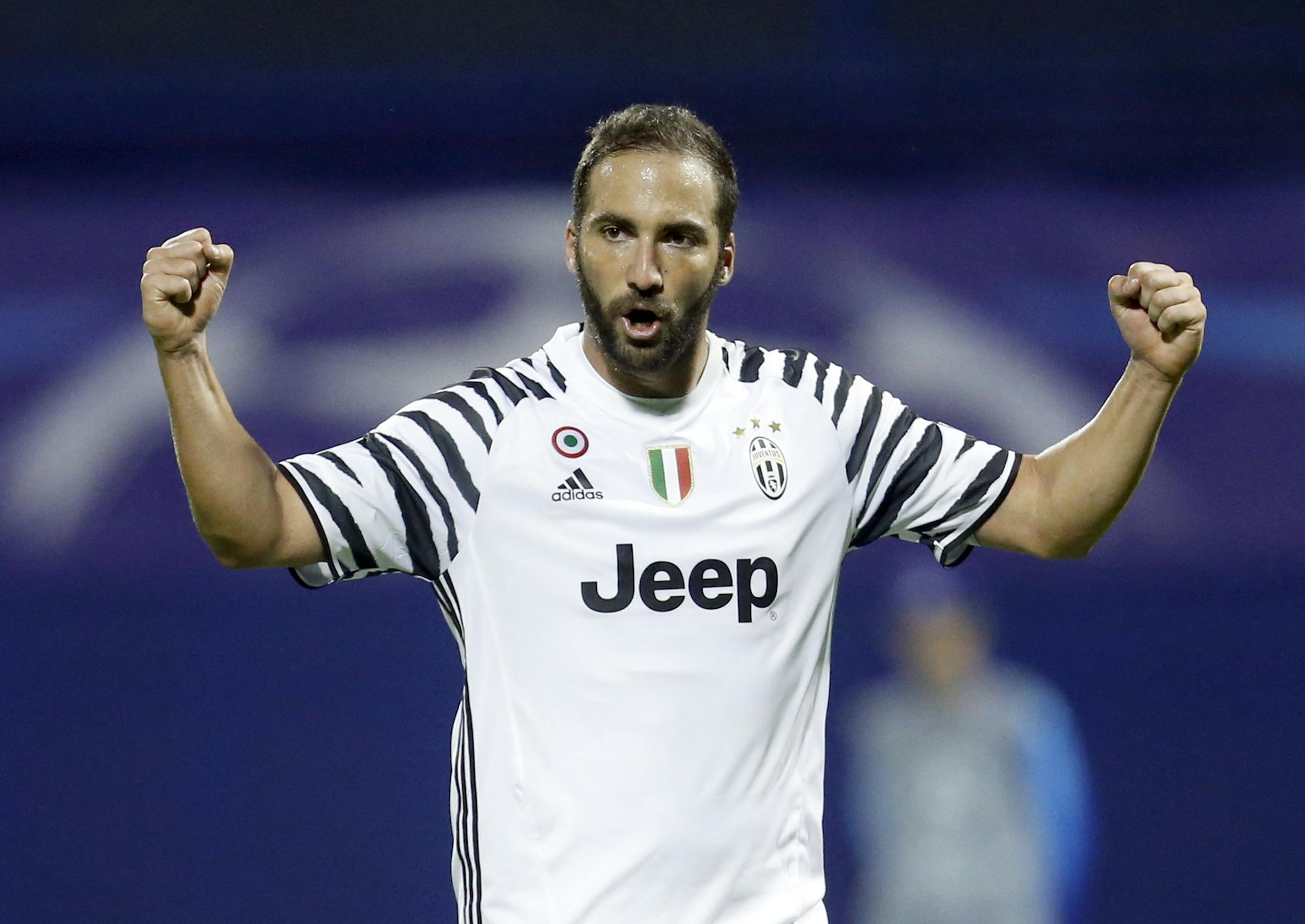 Juventus's Gonzalo Higuain celebrates after team mate Miralem Pjanic scored his side's first goal during the Champions League Group H soccer match between Dinamo Zagreb and Juventus, at Maksimir stadium in Zagreb, Croatia, Tuesday, Sept. 27, 2016. (AP Photo/Darko Bandic) ORG XMIT: MAS109