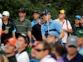 Jordan Spieth watches his tee shot on the 15th hole during the first round of the Masters golf tournament Thursday, April 9, 2015, in Augusta, Ga. (AP