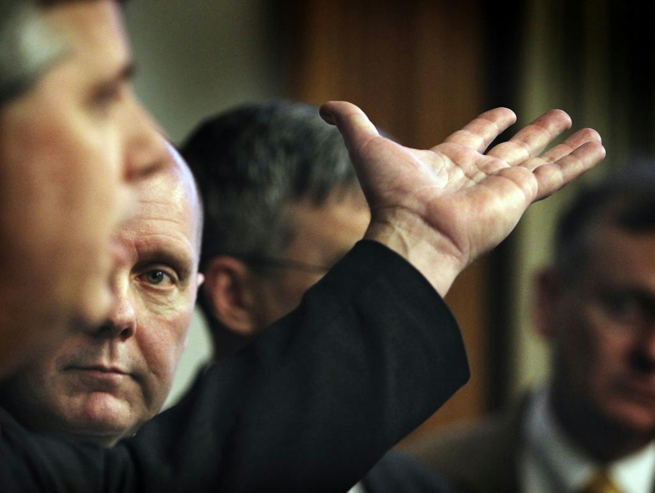 State Rep. Steve Drazkowski, in front, answered questions about a proposed constitutional amendment to keep workers from having to join unions. State Sen. Dave Thompson, at rear, was among those listening.