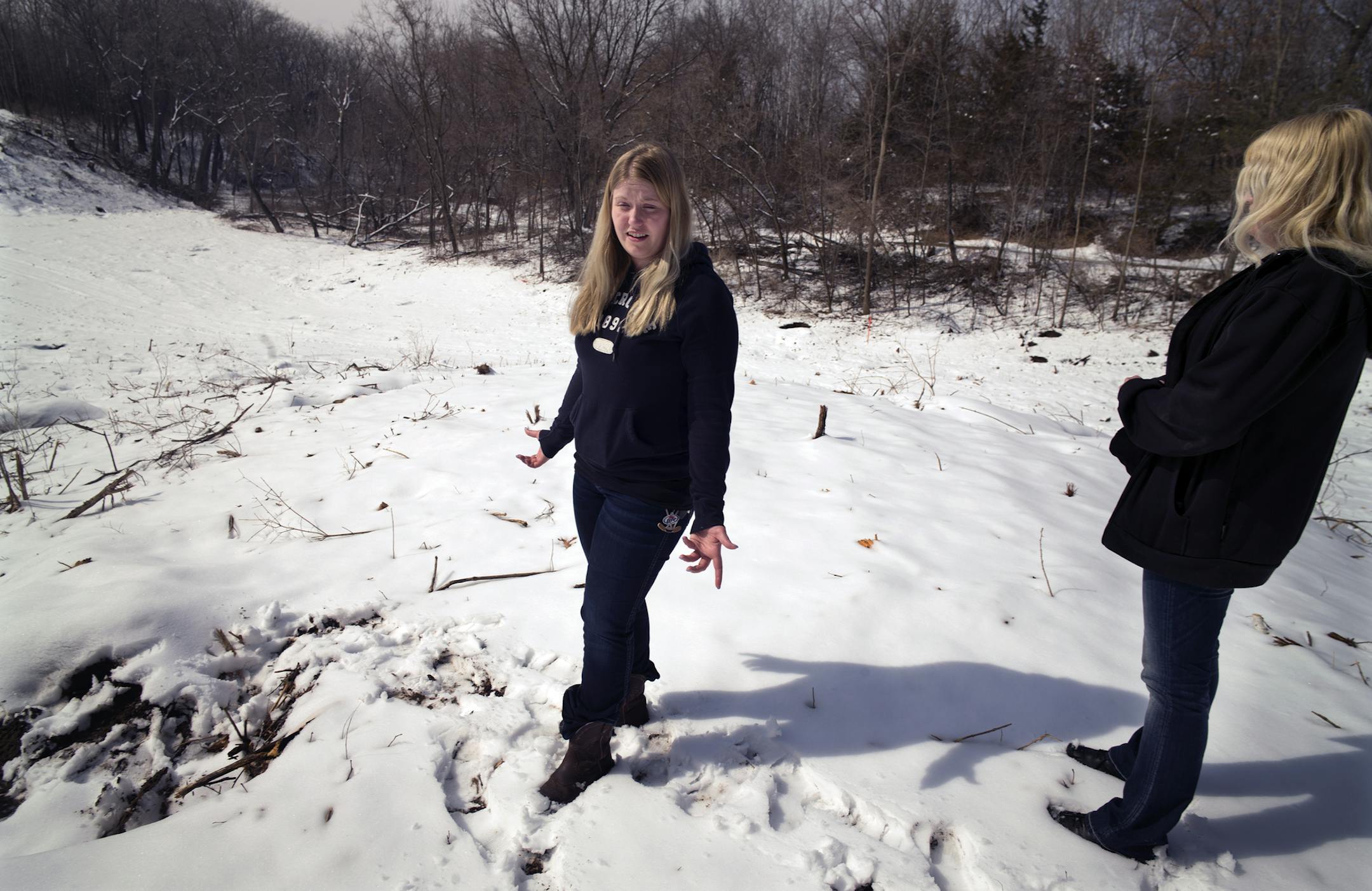 Kati, left, and her mother Nancy Drews, right, whose family's property was taken for trail construction through eminent domain showed the wide swath of land that was clear cut to make way for a paved trail .] Richard Tsong-Taatarii/rtsong-taatarii@startribune.com