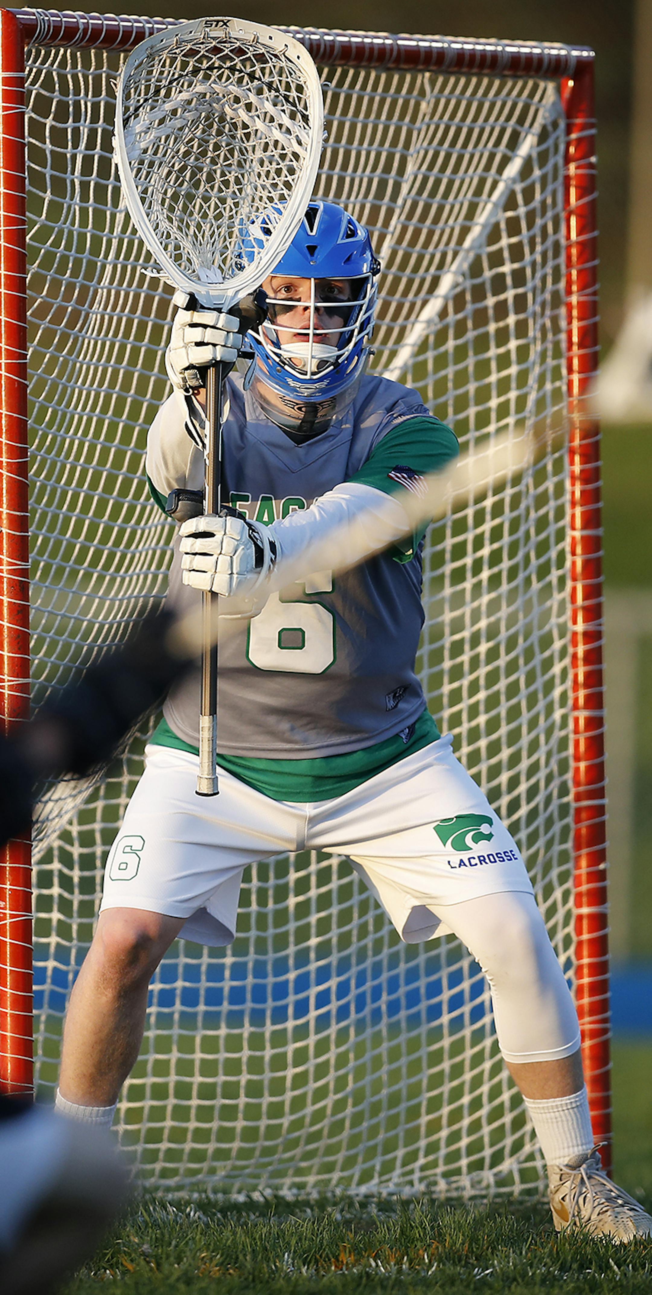Eagan goalie John Courington mans the goal during their game against Burnsville. ] LEILA NAVIDI ï leila.navidi@startribune.com BACKGROUND INFORMATION: The Eagan High School boys lacrosse team plays against Burnsville High School at Eagan High School on Tuesday, May 15, 2018. Eagan won the game 16-1.