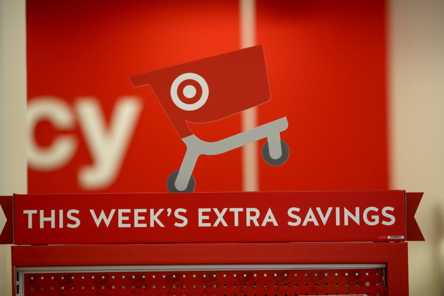 At the end of an aisle is a display for the cartwheel app at the Target Express in Dinkytown.