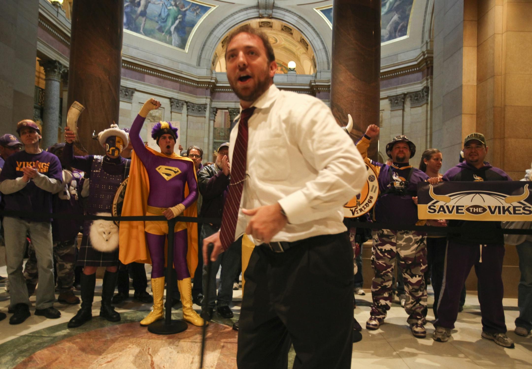 After speaking to Vikings fans before the start of the House session, Rep. John Kriesel (R) gets an ovation as he headed in to the sesssion at the Capitol in St. Paul, MN, Saturday, April 28, 2012.