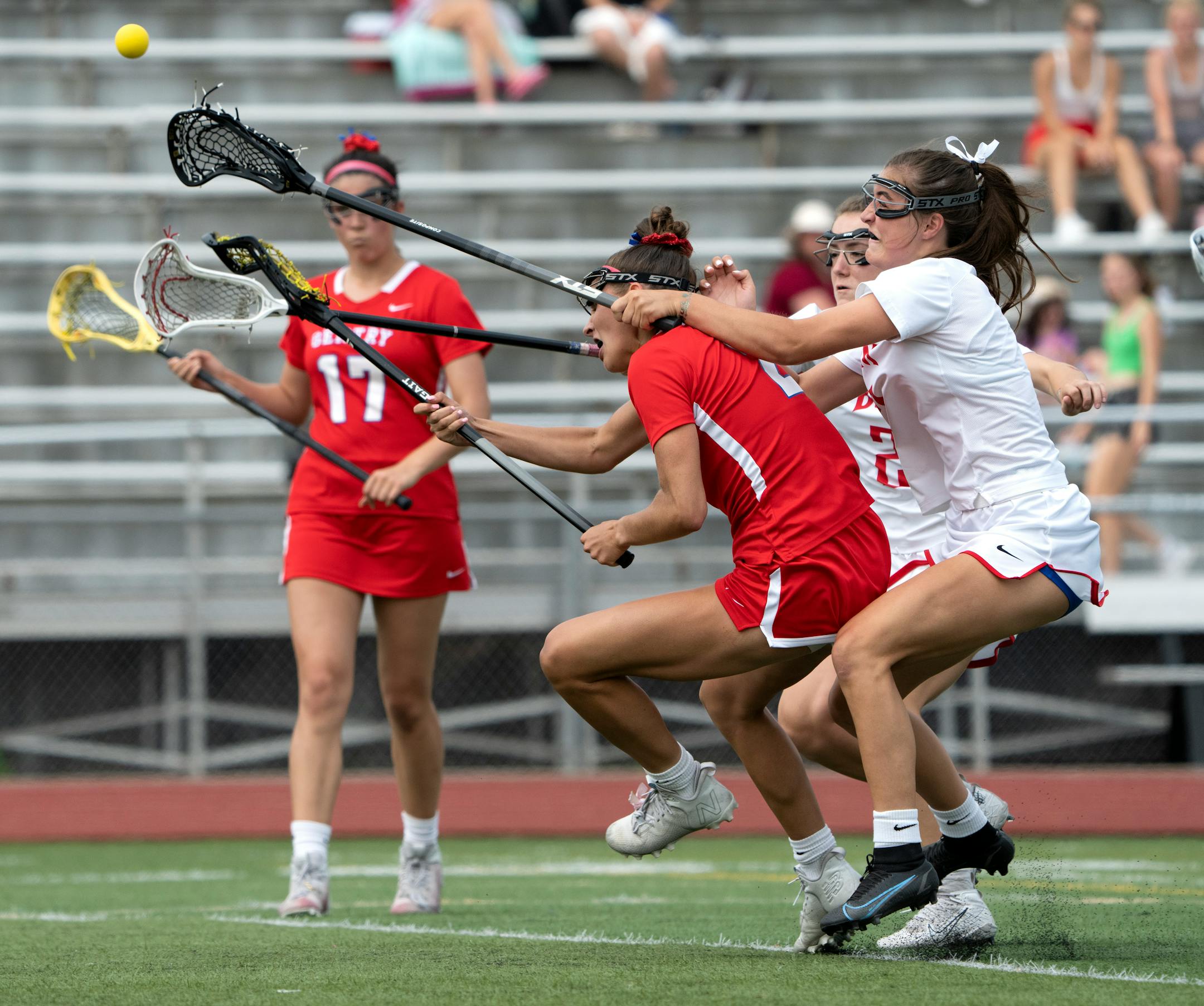 Day one of the girls state high school Lacrosse tournament got under way Tuesday, June 14, 2022 at Roseville High School in Roseville, Minn. Here, Gentry AcademyÕs Jaylen Rosga and Benilde-St. MargaretÕs Mary Zavoral battle for control in the 1st half. ] Brian Peterson ¥ brian.peterson@startribune.com