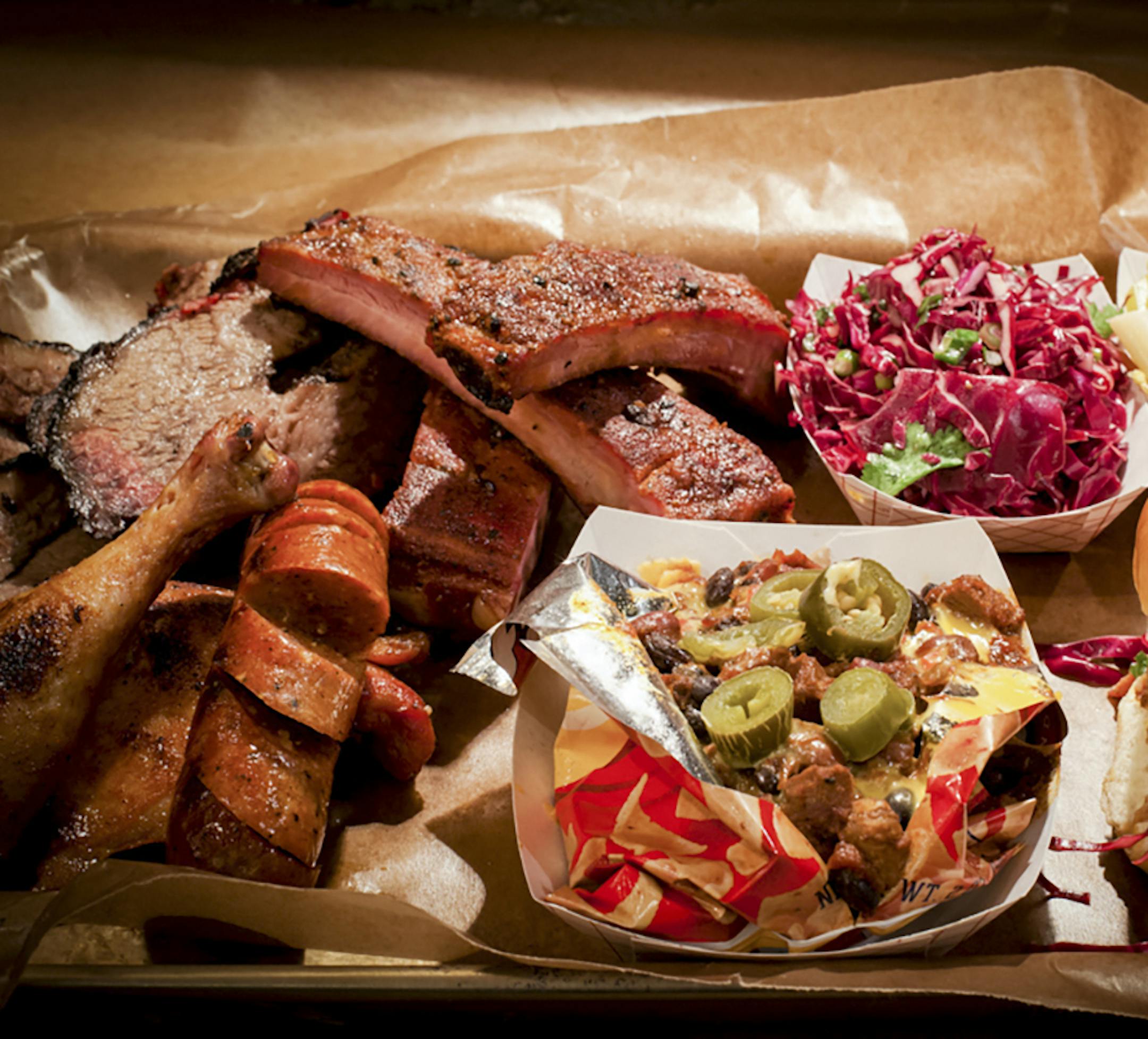 -- PHOTO MOVED IN ADVANCE AND NOT FOR USE - ONLINE OR IN PRINT - BEFORE MARCH 1, 2015. -- An undated handout photo of a variety of dishes from Green Street Smoked Meats in Chicago. The restaurateur Brendan Sodikoff’s latest venture offers Texas barbecue, about as authentic as it can be 1,000 miles northeast of Austin. (Kari Skaflen via The New York Times) -- NO SALES; FOR EDITORIAL USE ONLY WITH STORY SLUGGED CHICAGO BARBECUE ADV01. ALL OTHER USE PROHIBITED. --