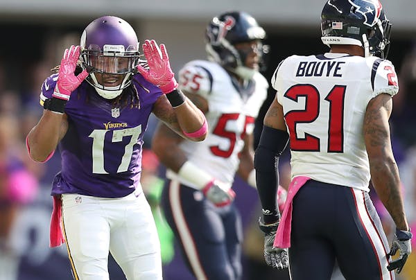 Minnesota Vikings wide receiver Jarius Wright teased Houston Texans cornerback A.J. Bouye after his run during the first quarter as the Vikings took o