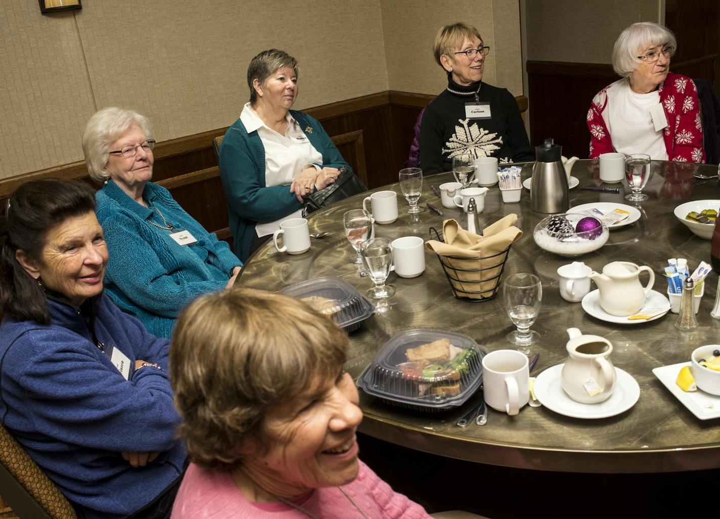 Lois Club members listened to Lois Voss, not pictured, as she ran the meeting portion of the Lois Club's afternoon luncheon at the Sheraton in Minnetonka. ] (AARON LAVINSKY/STAR TRIBUNE) aaron.lavinsky@startribune.com t's one of the most exclusive clubs in the nation: The Lois Club, a society for women who are named Lois, and only Lois. The club was founded in St. Paul in 1979 when two Loises met at random. Now, it's national. But as the name Lois dies out, will the club, too? We photograph the