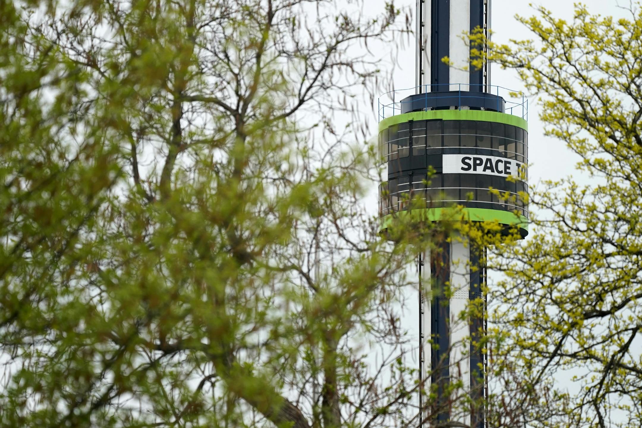 The Space Tower sat suspended midway through its track Thursday.