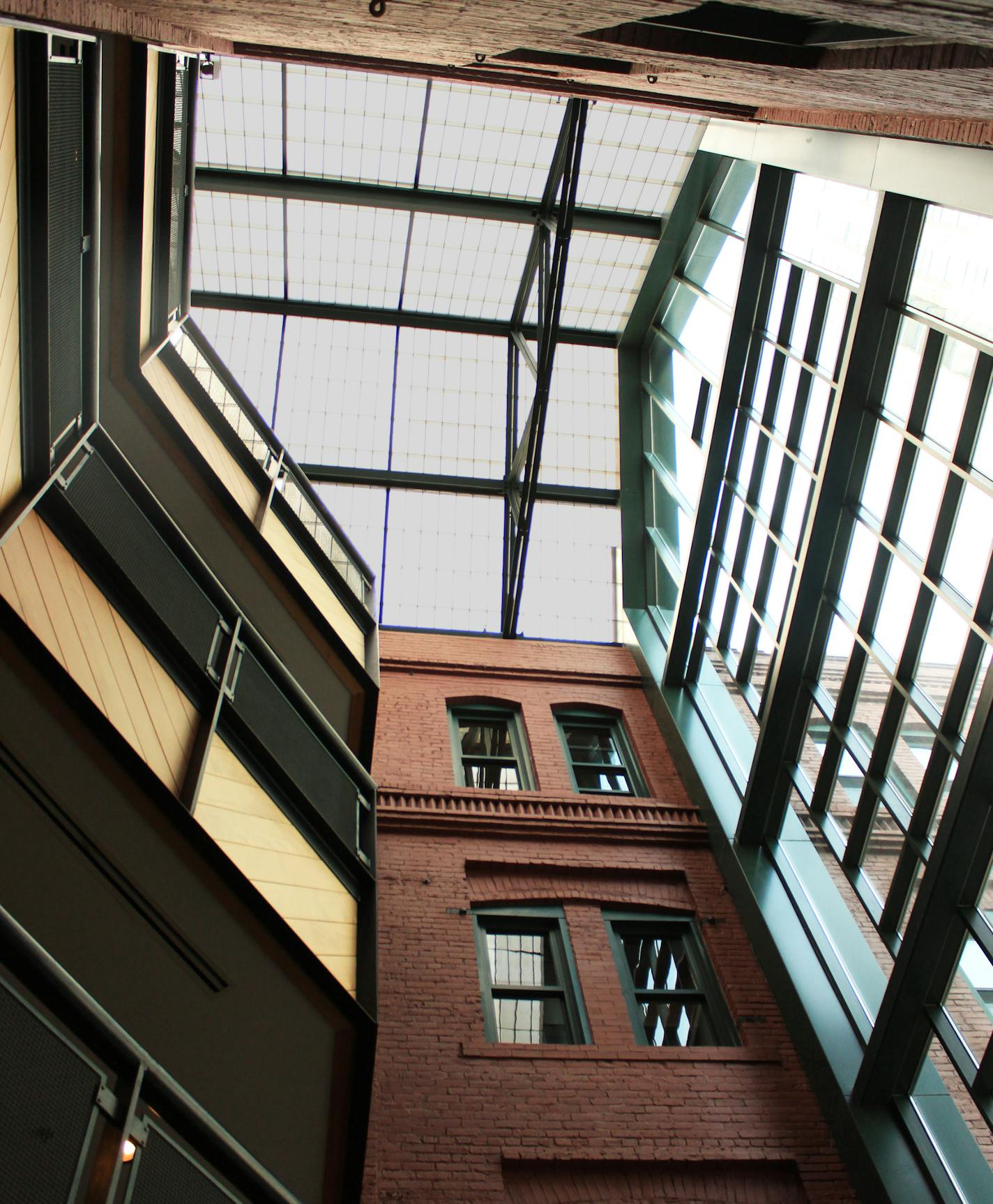 The central area of the current Mill Place building has glass ceilings that allow natural light.]Sophie Hoover Star Tribune Intern