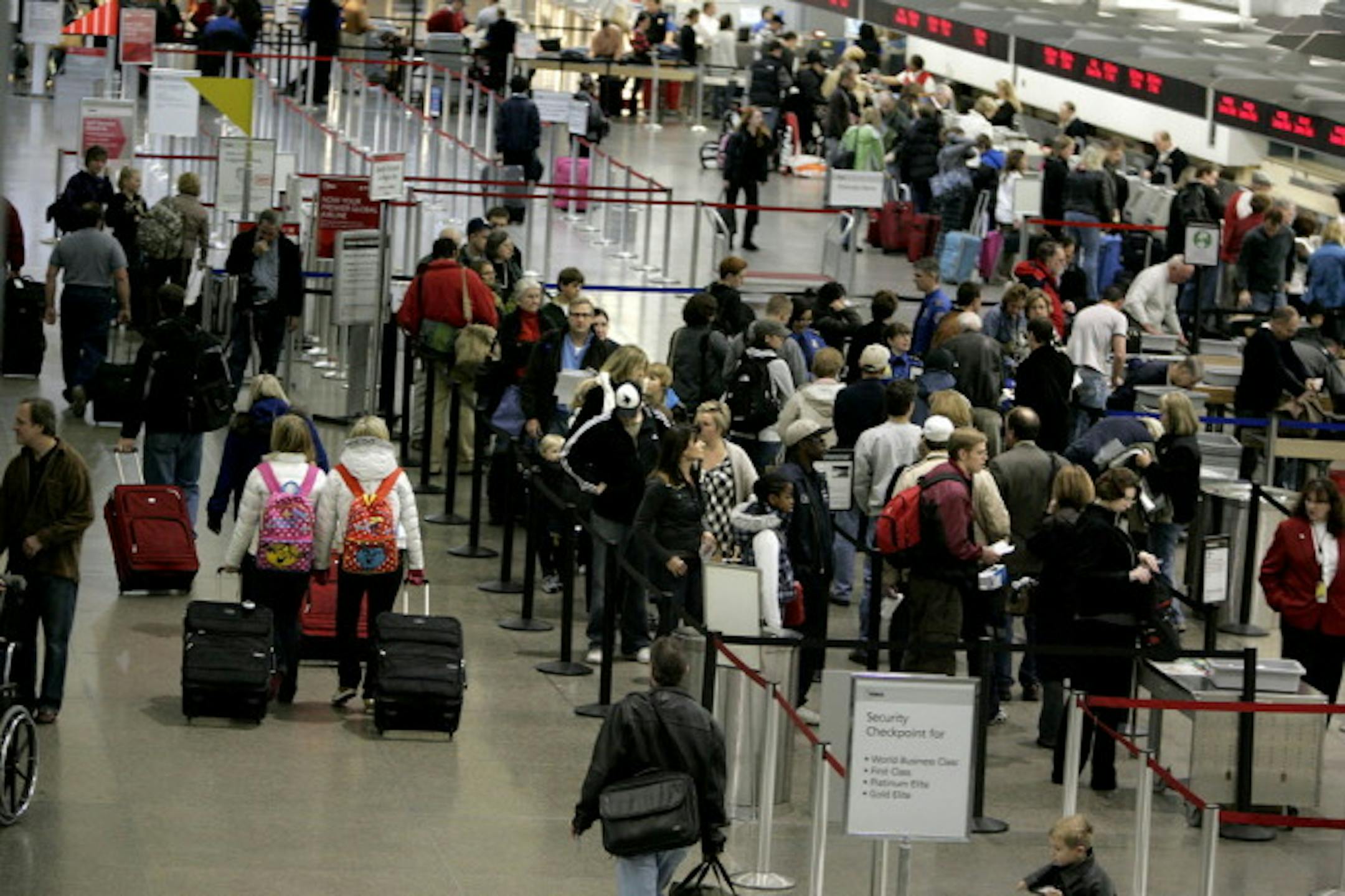 Passenger lines flowed smoothly today as holiday travelers made their way to ticketing areas at the Minnneapolis/St. Paul International Airport.