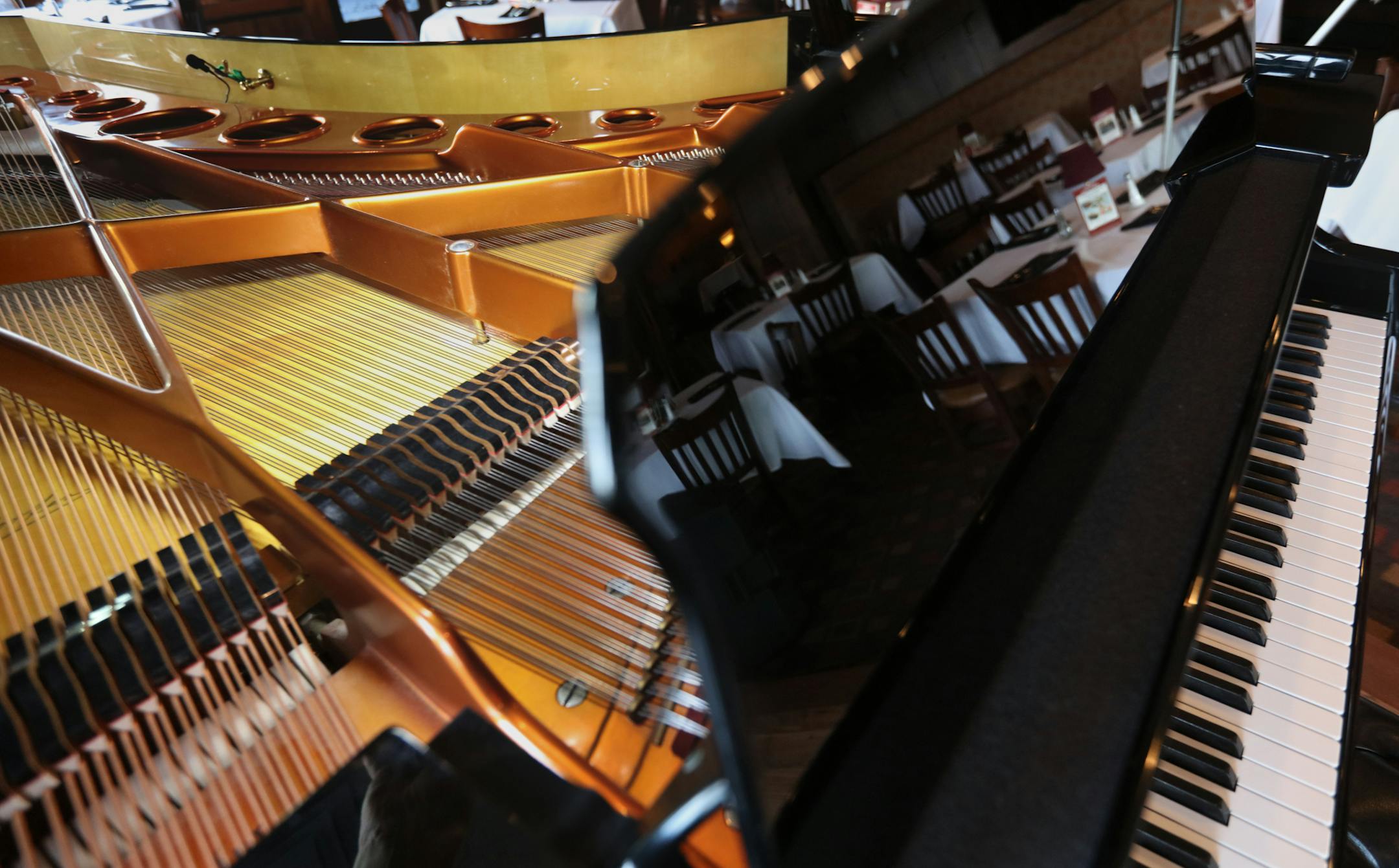The room was reflected in the Bosendorfer, which has four extra keys on the bass end.