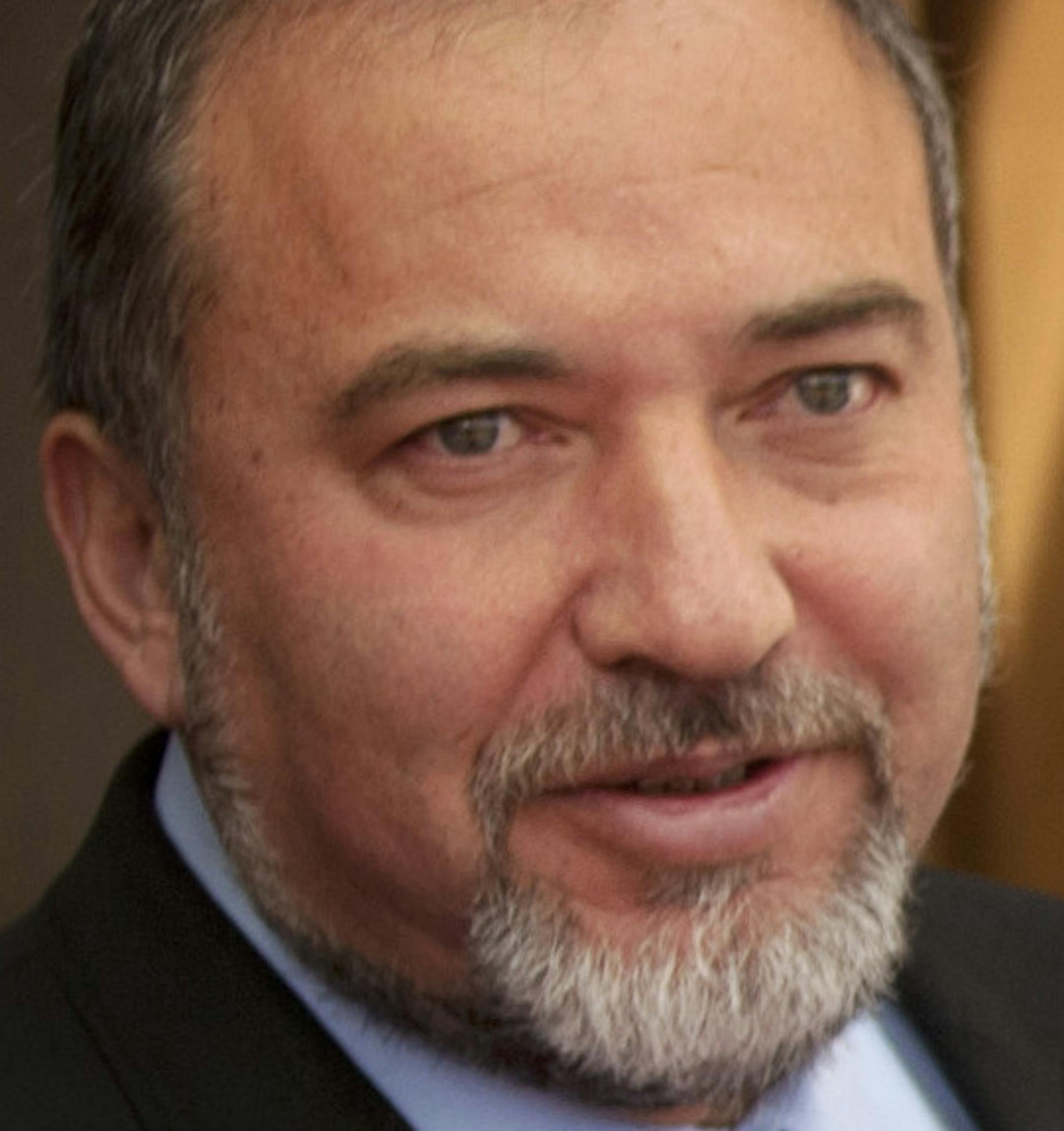 Israel's Foreign Minister Avigdor Lieberman, left, shakes hands with European Union foreign policy chief Catherine Ashton, prior to their meeting in Jerusalem, Tuesday, Feb. 15, 2011. Ashton is on an official visit to the region. (AP Photo/Sebastian Scheiner)