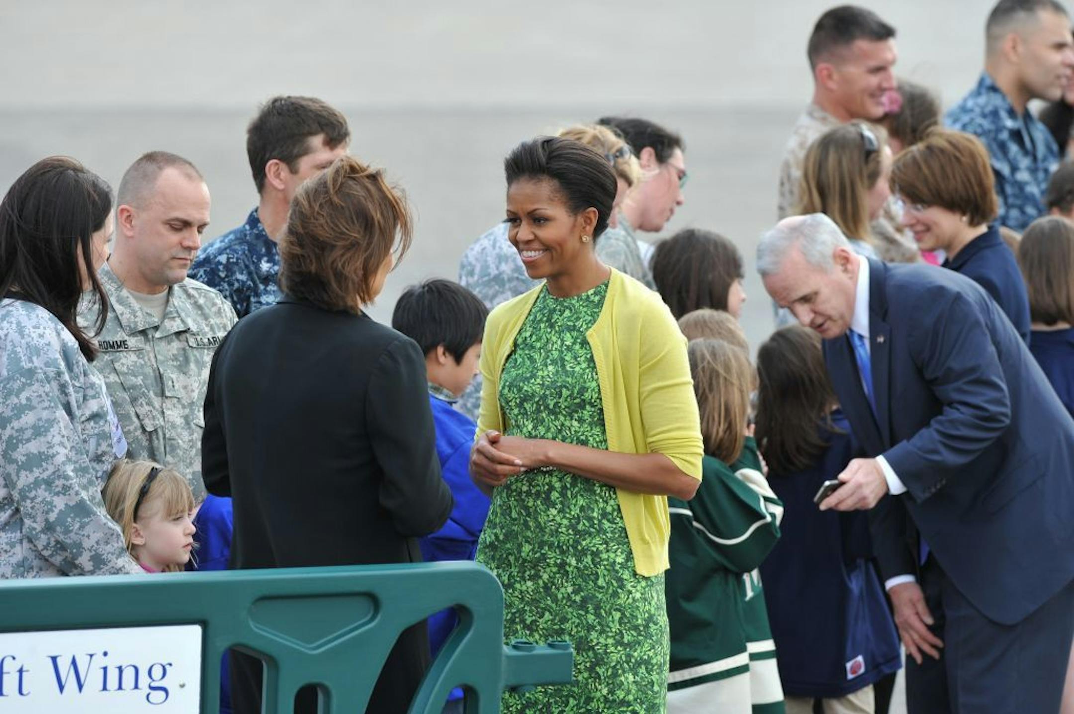 Michelle Obama arrives at MSP airport, greeted by Gov. Dayton, others.