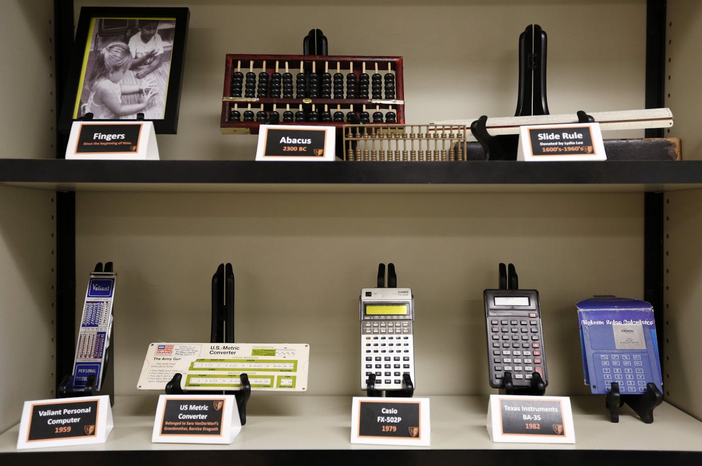 A small museum of mathematical calculators is displayed in Sara Van Der Werf&#x2019;s advanced algebra class at South High. An app called Desmos is a free graphing calculator that can be downloaded onto a phone for use in the classroom, and at home.