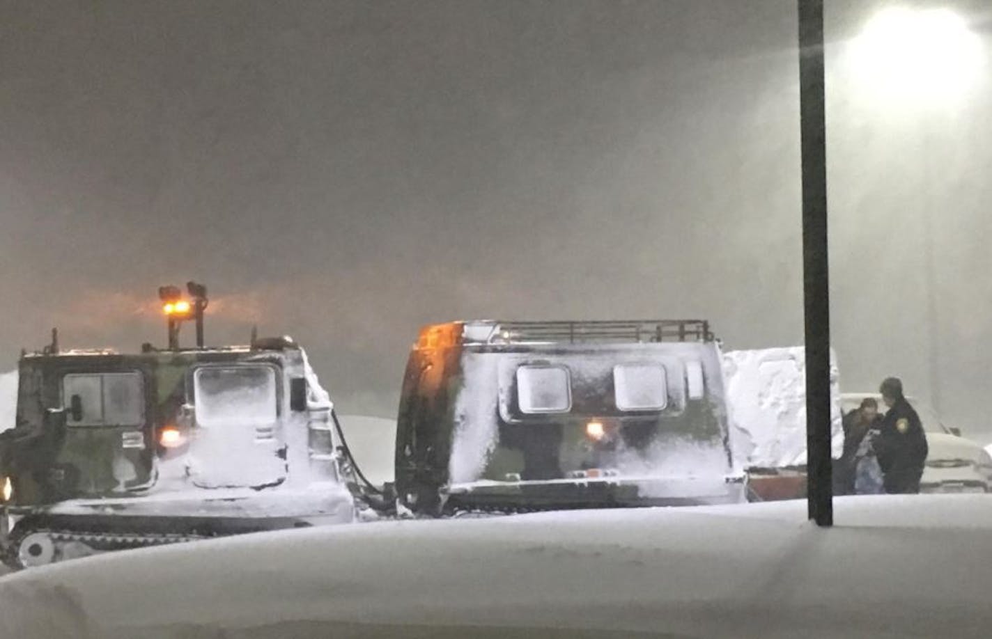 Three people were rescued from impassable roads by the Minnesota National Guard. Here they are arriving at the Albert Lea armory.