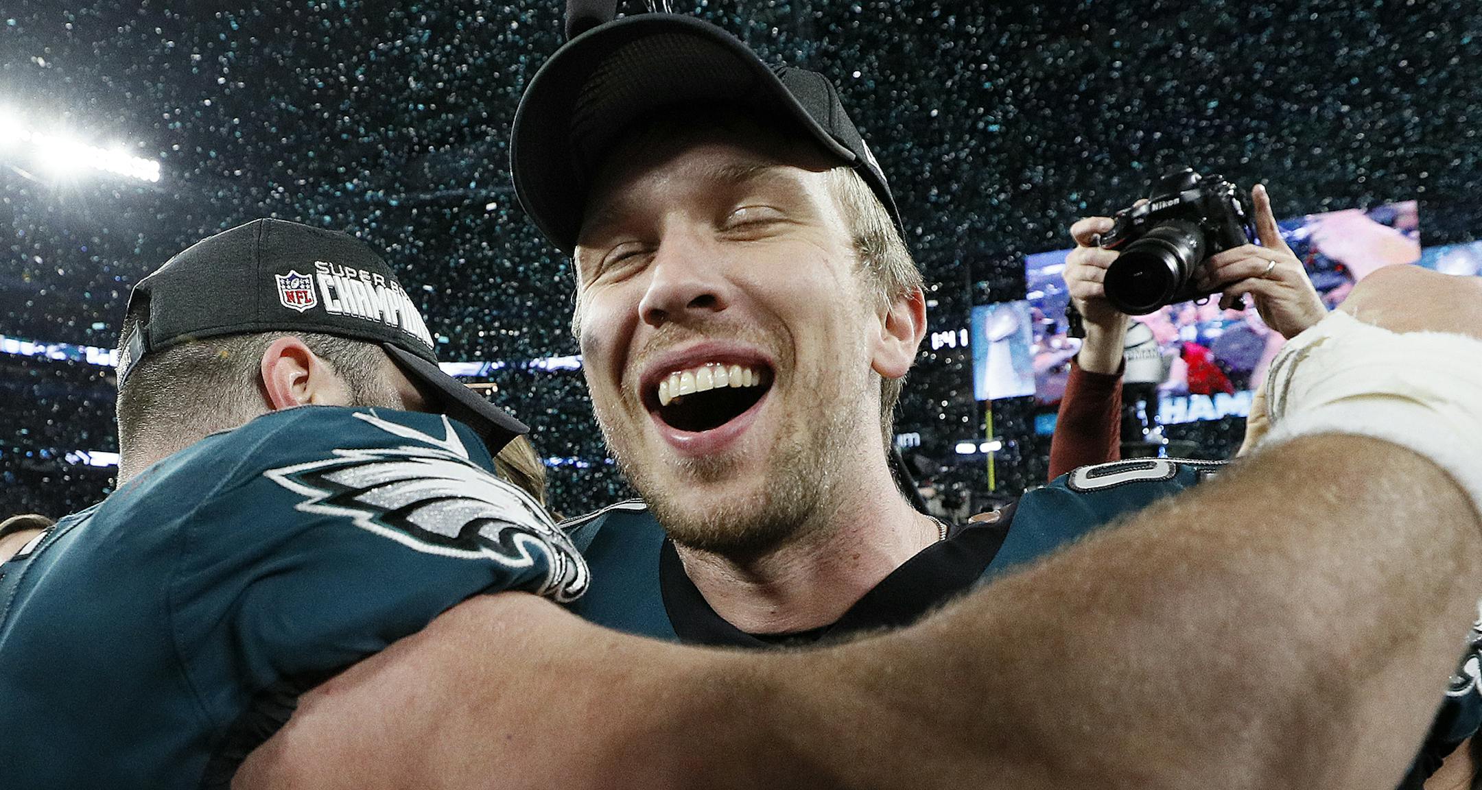 Eagles quarterback Nick Foles (9) joined teammates in celebrating their victory over the New England Patriots in Super Bowl LII at U.S. Bank Stadium in Minneapolis. ] Carlos Gonzalez ï Carlos. Gonzalez@startribune.com The New England Patriots met the Philadelphia Eagles in Super Bowl LII Sunday evening, February 4, 2017 at U.S. Bank Stadium in Minneapolis.
