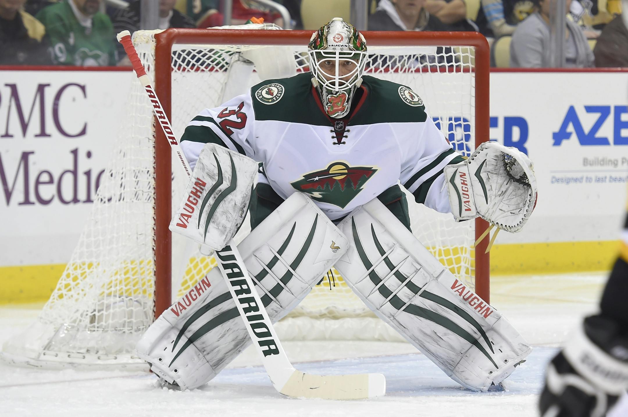 Minnesota Wild goalie Niklas Backstrom (32) defends the net during the second period in the Pittsburgh Penguins 7-2 win against the Minnesota Wild at the Consol Energy Center in Pittsburgh, Pennsylvania. (Icon Sportswire via AP Images)
