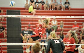 Willmar senior Sydney Schnichels looks on after attacking the ball during a non-conference match against Marshall on Thursday, Aug. 25, 2022 at the Bi