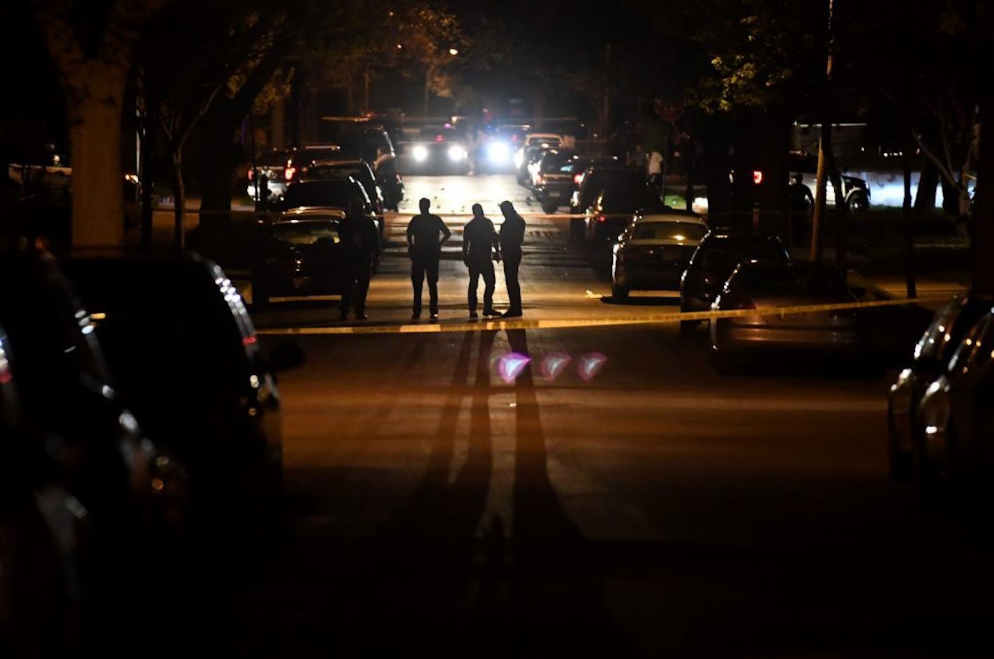 Minneapolis police shut down Newton Avenue N. to investigate Wednesday night's shooting.