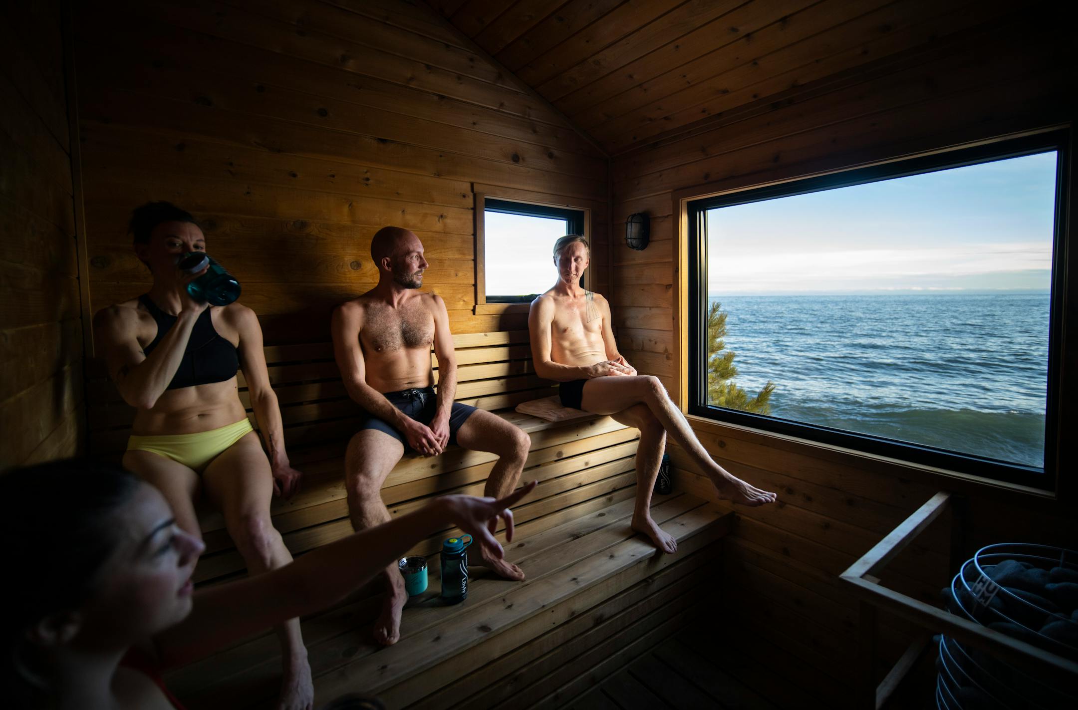 Ana Macy, from left, Tabitha Blanchard, Sven Hoaglund and Shaun Tutor enjoy a sauna session at Sisu and Löyly Sauna.